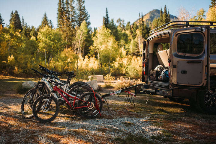 van with 6 bike car rack in camp mode